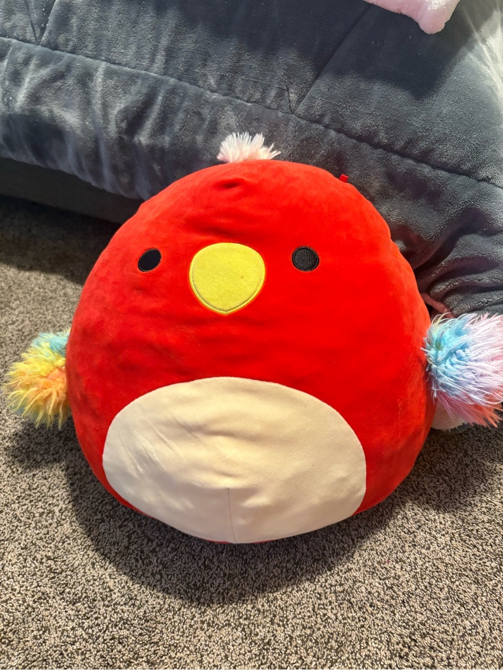 Squishmallows Red Plush Bird with Cream Belly and Rainbow Pom Wings